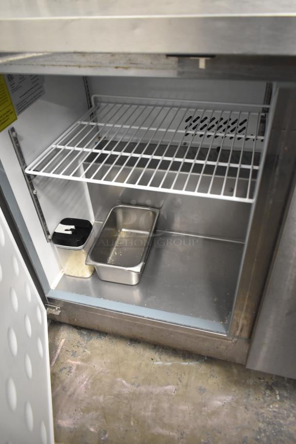 Yukon YUC-72F commercial 3-door undercounter freezer on casters, stainless steel, 115V, 1 phase, slightly worn condition.