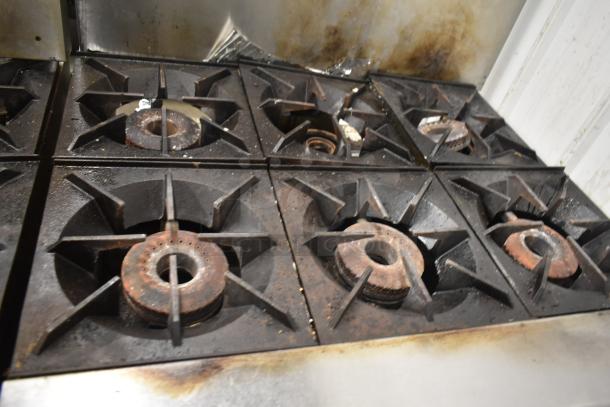 Therma-tek TMD36-6-1N 6 burner range, commercial natural gas, includes oven and backsplash, used condition, visible wear.