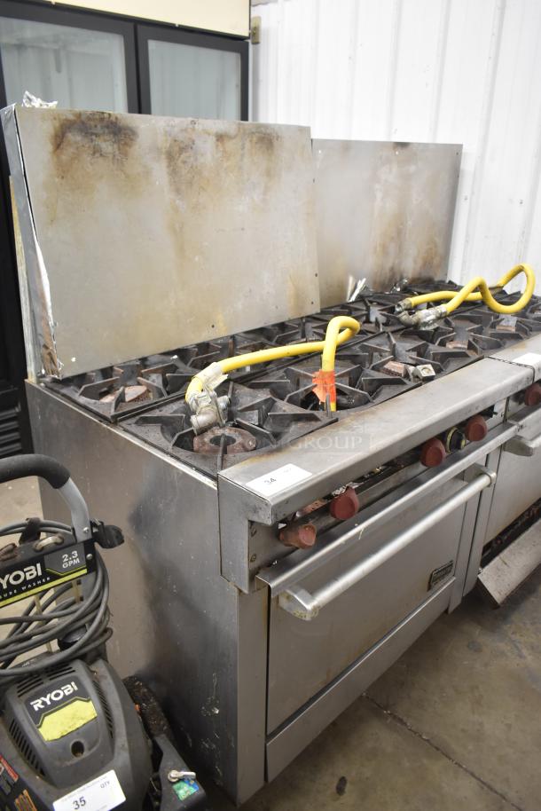 Therma-tek TMD36-6-1N commercial gas range with 6 burners, oven, and backsplash. Visible wear; yellow gas hoses included.