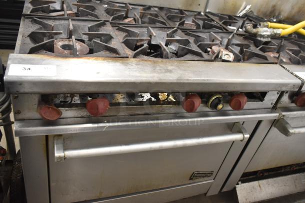 Therma-tek TMD36-6-1N commercial 6 burner range with oven, natural gas, red knobs, stainless steel, used condition.