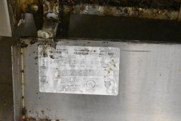 Therma-tek TMD36-6-1N label on commercial gas range showing model and UL certification, some wear visible.