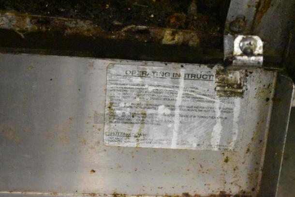 Therma-tek TMD36-6-1N commercial 6 burner range, natural gas, with oven and backsplash. Visible wear and instruction label.