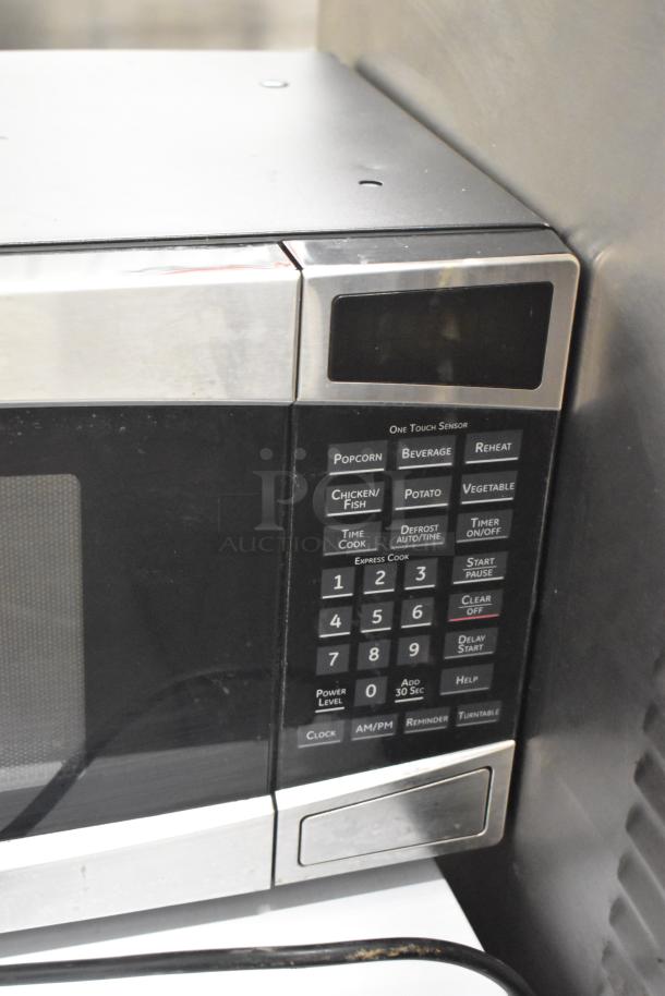 General Electric GE Profile PEM31SM4SS microwave oven, black and silver finish, control panel with sensors, 120V, 1 phase.