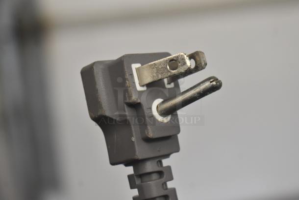 The image shows a power plug for the General Electric GE Profile PEM31SM4SS microwave oven.