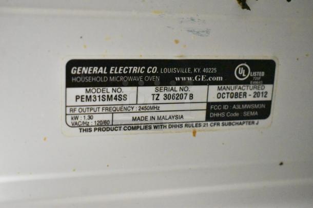 General Electric GE Profile PEM31SM4SS Microwave Oven label, showing model number, serial, and manufacturing details.