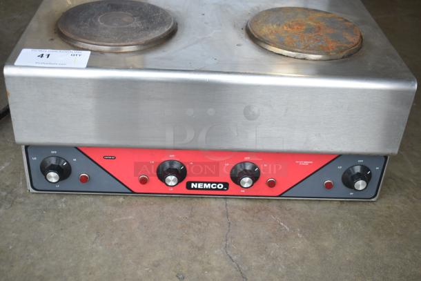 Nemco 6311-2-240 commercial 4 burner electric hot plate, countertop model, showing wear. 240V, 1 phase, with control knobs.