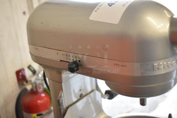 KitchenAid KF26M22SR Countertop Mixer, 6 Quart, with speed settings visible. Signs of use on exterior. Model number label present.