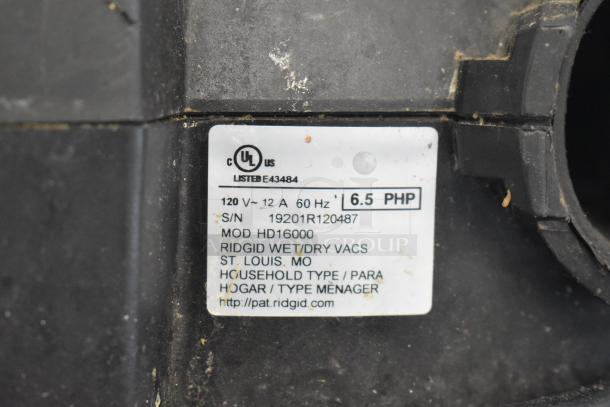 Rigid HD16000 Wet Dry Shop Vac Vacuum Cleaner label showing 120V, 6.5 PHP, model HD16000, and serial number.