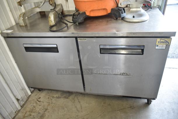 Yukon YUC-60F Commercial 2 Door Undercounter Freezer on casters, stainless steel, used, 115V, 1 Phase, visible Yukon label.