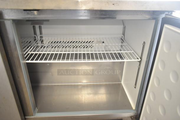 Yukon YUC-60F commercial 2-door undercounter freezer with wire shelving, in good condition. 115V, 1 phase, on casters.