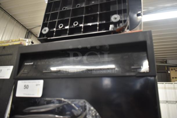 Honeywell 1014783275 18-inch dishwasher, 8 settings, 6 programs. Black exterior, visible control panel, appears in good condition.