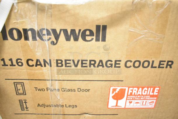 Box displaying Honeywell H115BCS 115 Can Beverage Cooler. Features: Two-pane glass door, adjustable legs, fragile label.