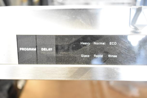 "2025 Honeywell HDS18SS Dishwasher control panel showing program options: Heavy, Normal, ECO, Glass, Rapid, Rinse."