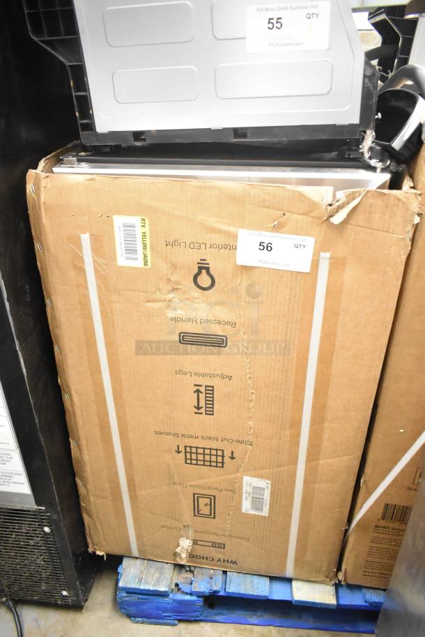 Brand new Honeywell H115BCS can cooler in packaging, visible scratches and dents, labels showing 115 volts, 1 phase.