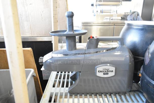 Tribest GS-P502 GreenStar Pro juicer, gray, 120 volts, 1 phase. Like new, logo visible, suitable for countertop use.