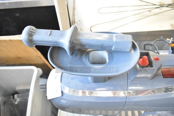 Tribest GS-P502 GreenStar Pro juicer, 120V, 1 phase, with feeding chute and pusher. Shows moderate wear, tag marked 'Q3'.