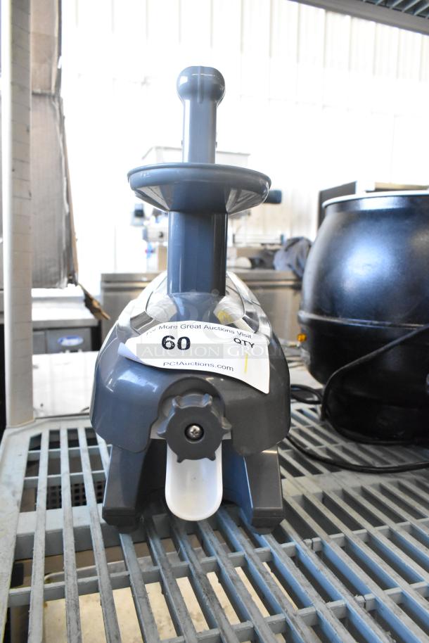 Tribest GS-P502 GreenStar Pro juicer, 120V, 1 Phase, countertop model, clean condition, auction tag visible.