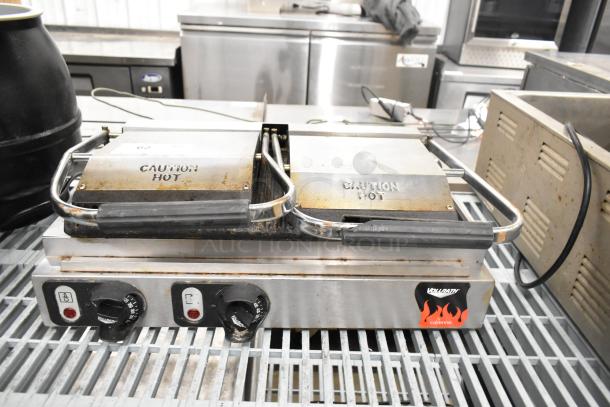 Vollrath TSI8002 40796 commercial double panini press, 220V, 1 phase, showing slight wear, "Caution Hot" labels visible.