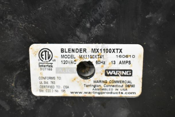 Waring MX1100XTX blender base tag, 120V, 60Hz, 13A. Model MX1100XT41. ETL certified. Waring Commercial branding.