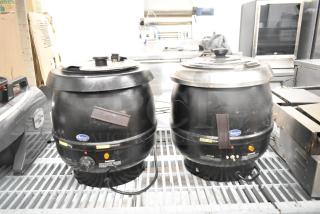 2 Chefmate CPSKB1 commercial countertop soup kettles, black, with control knobs and warning labels, 120 volts, good condition.