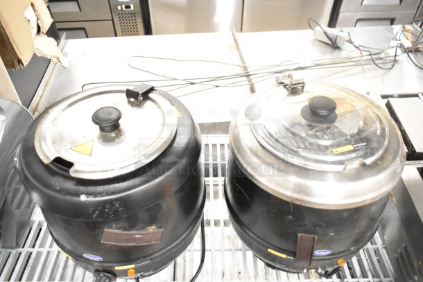 2 Chefmate CPSKB1 soup kettles, 120V, with lids, used condition, ideal for commercial food warming.
