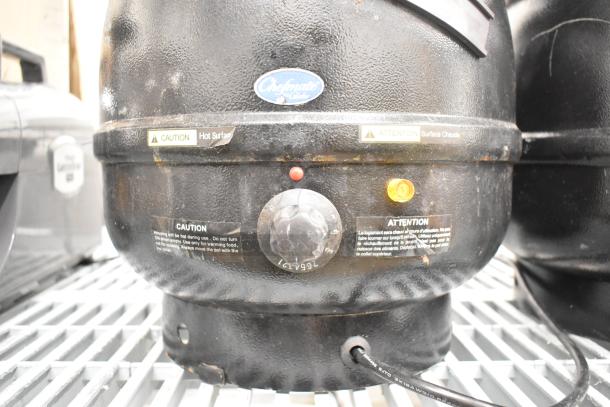 2 Chefmate CPSKB1 soup kettles, black, metal, commercial countertop, with warning labels, dial controls, 120 volts, 1 phase.