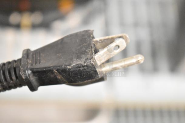 Power plug for Chefmate CPSKB1 Commercial Soup Kettle, 120 Volts, 1 Phase. Close-up detail of electrical prongs.