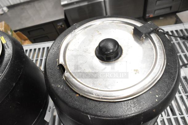 2 Glenray commercial soup kettles, 120V, black with silver lids, visible wear, suitable for countertops, labeled "66".