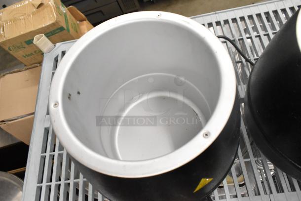 2 Glenray commercial countertop soup kettles, 120 volts, 1 phase. Used condition, interior view shown.