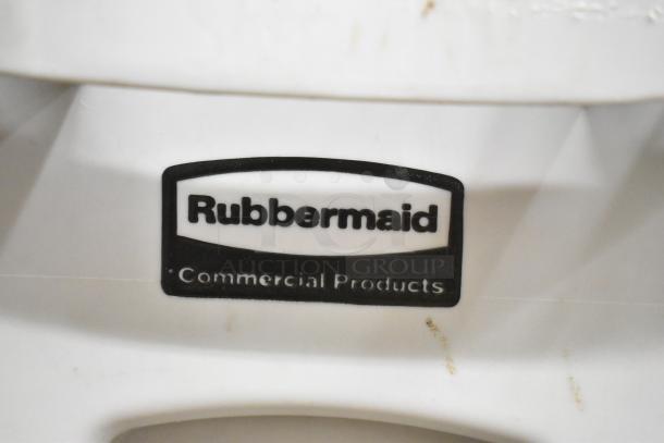 Rubbermaid Brute gray poly Slim Jim trash can, includes tongs and serving spoons. Features visible Rubbermaid logo.