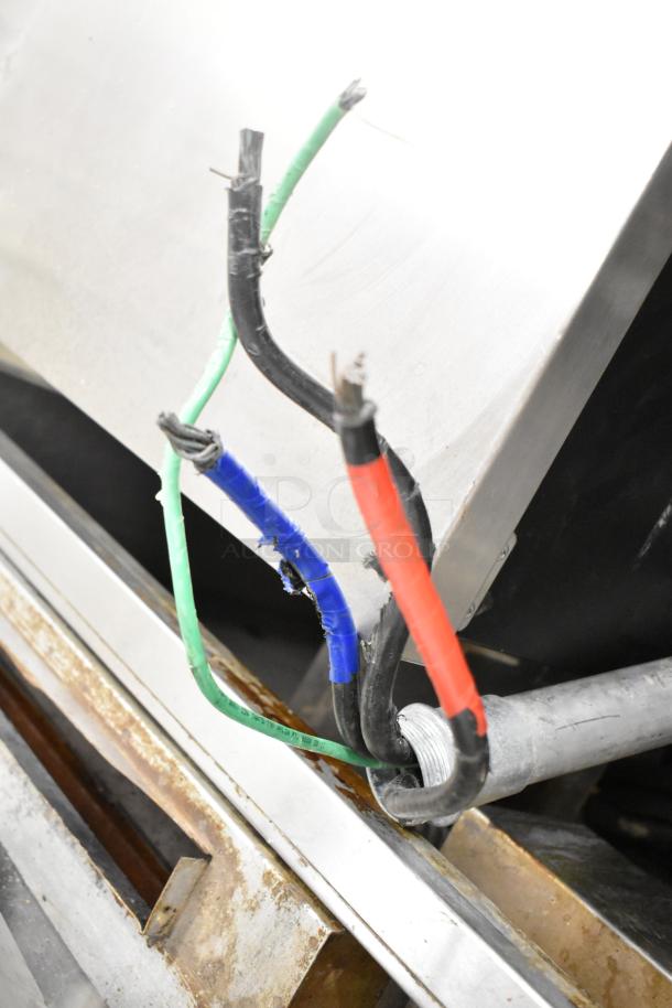 Cleveland KEL-100 100-gallon steam jacketed kettle wiring, showing colored electric wires and stainless steel body.