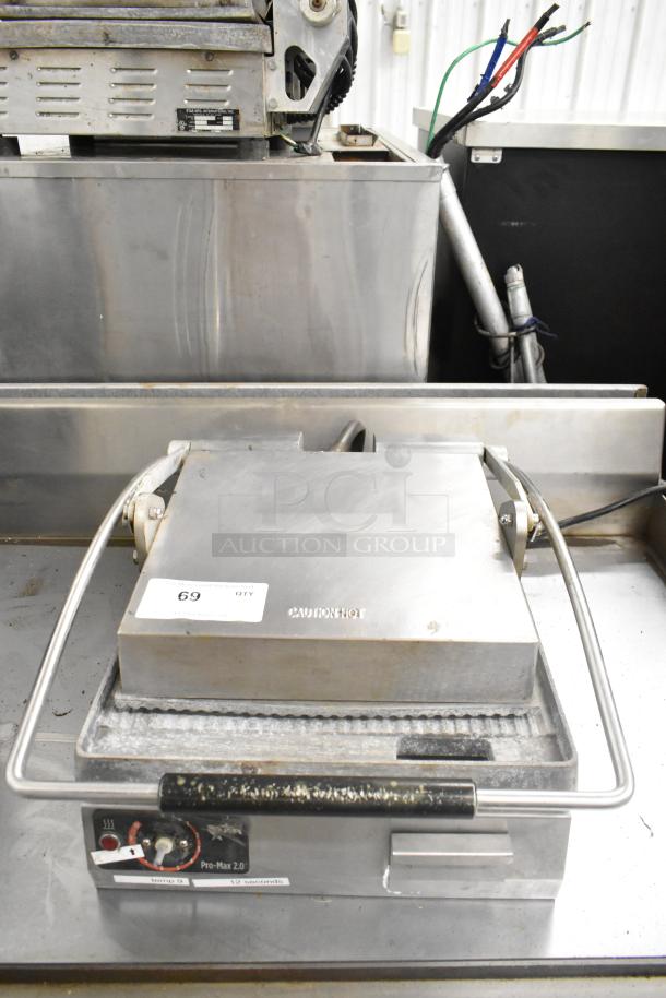 Star SGT14 Commercial Countertop Panini Press, 120V. Features heat indicators. Condition shows signs of use.