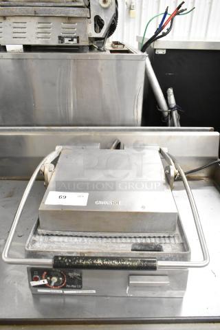 Star SGT14 Commercial Countertop Panini Press, 120V. Features heat indicators. Condition shows signs of use.