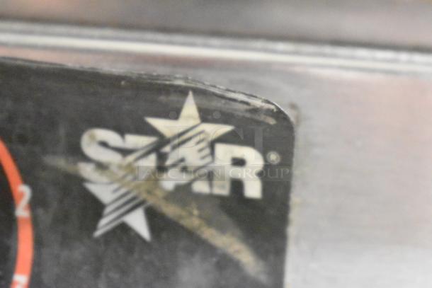 Star SGT14 Commercial Panini Press, logo detail, used condition, 120V, 1 Phase.