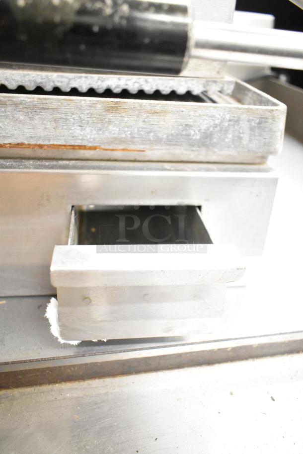 Star SGT14 Commercial Panini Press, stainless steel, 120V, 1 phase, slight wear, features grooved plates and drip tray.