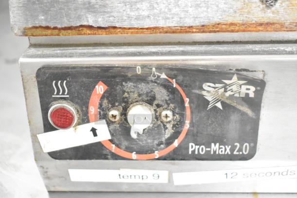 Star SGT14 Commercial Panini Press, temperature dial from 0-10, showing signs of wear. Model: Pro-Max 2.0. 120V, 1 Phase.