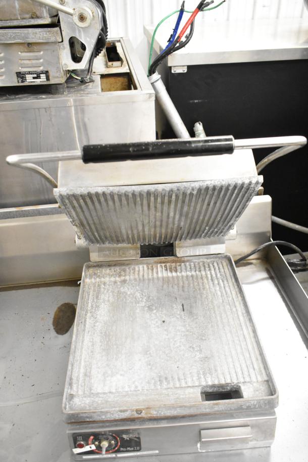 Star SGT14 Commercial Panini Press, 120V, 1 Phase, used condition with ribbed plates, countertop model.