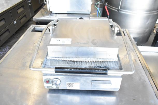 Star PGT14 commercial countertop panini press, 120 volts, 1 phase, stainless steel, good condition. Auction label visible.