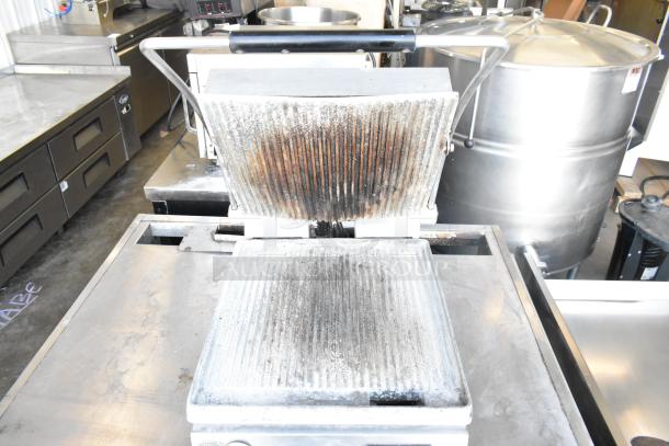 Star PGT14 Commercial Countertop Panini Press, 120 Volts, used condition, visible wear on grooved plates, heavy-duty design.
