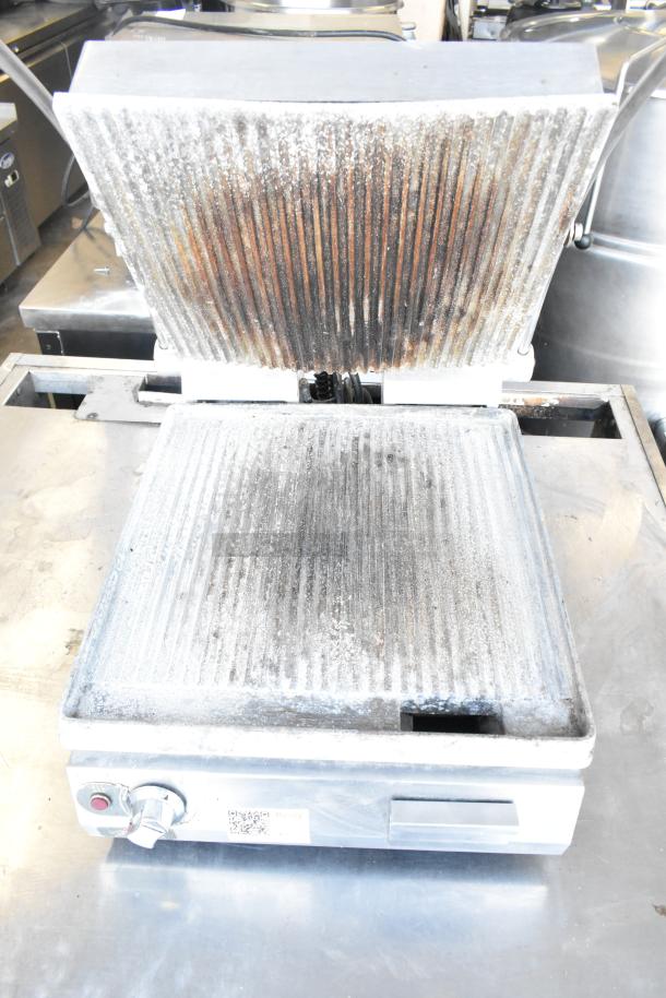 Star PGT14 Commercial Panini Press, 120V, 1 Phase, used, visible wear on plates, control knob and QR label on the front.