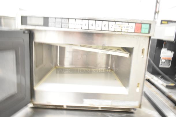 Panasonic NE-21521 Commercial Microwave Oven, 208V, 1 Phase, clean interior, control panel visible, durable stainless steel.