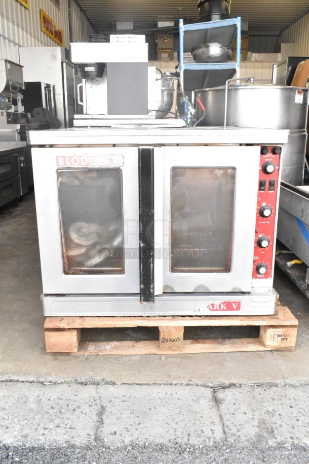 Blodgett Mark V Commercial Convection Oven, full size, view-through doors, thermostatic controls, legs on casters.