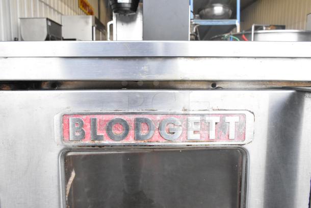 Blodgett Mark V convection oven with view-through doors, showing brand logo. Includes legs on casters; good condition.