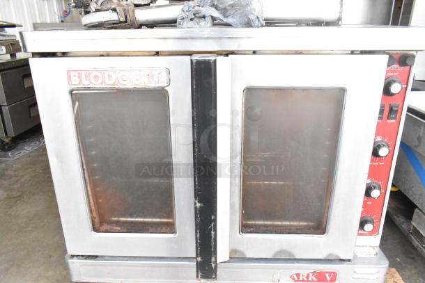 Blodgett Mark V commercial convection oven with view-through doors, thermostatic controls, on legs with casters.