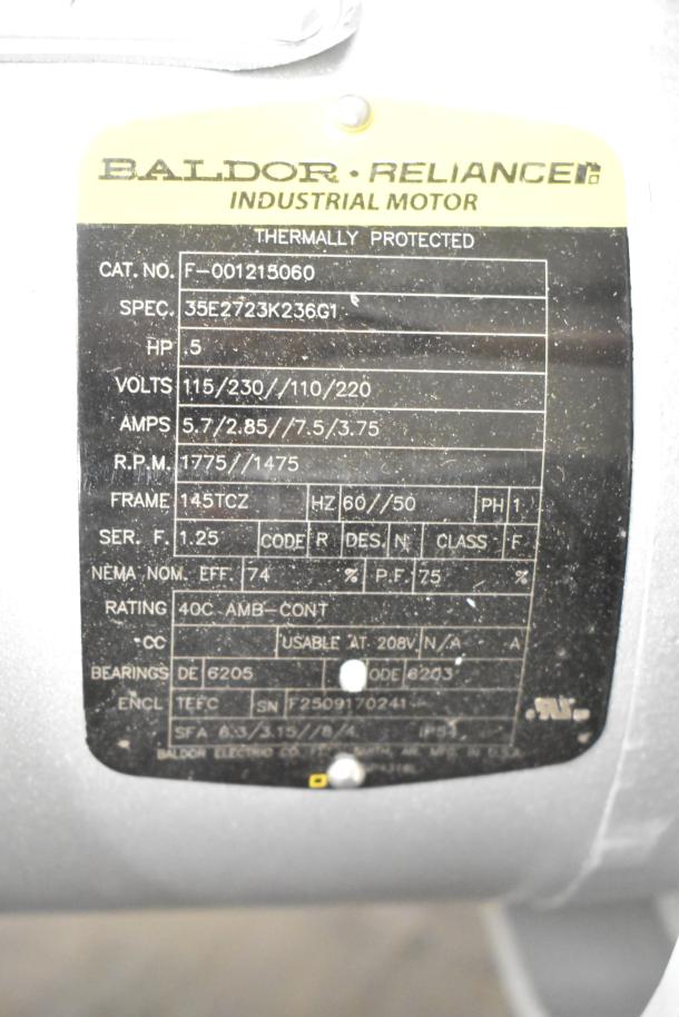 Hoabrt garbage disposal with Baldor Reliance industrial motor label, 115/230/110/220 volts, 1 phase, catalog details shown.
