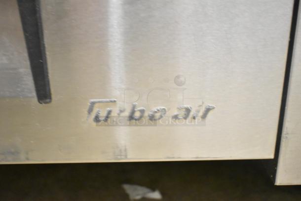 Turbo Air TCBE-36SDR-E-N6 chef base, metal finish, logo visible. 2 drawers, commercial casters. 115V, 1 Phase.