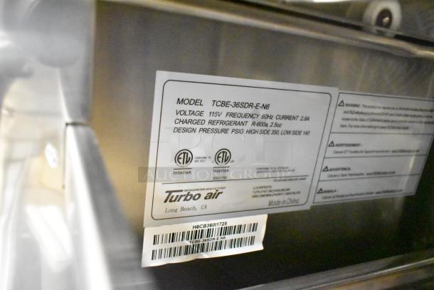 Turbo Air TCBE-36SDR-E-N6 commercial chef base, 2 drawers, on casters, 115V, ETL-certified, model label visible.