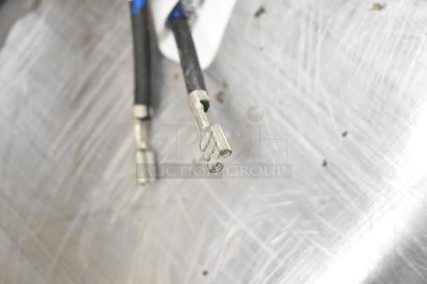 Three Heatcraft components: 4403S pan heater, 24752203 drain pan heater, 24710202 defrost coil element. Includes connections.