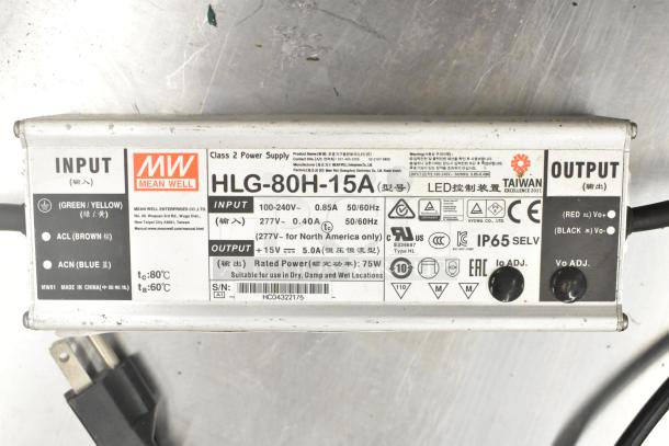 Mean Well MW HLG-80H-15A Power Supply, input 100-240V, output +15V/5A, labels show IP65, CE, and UL certifications.