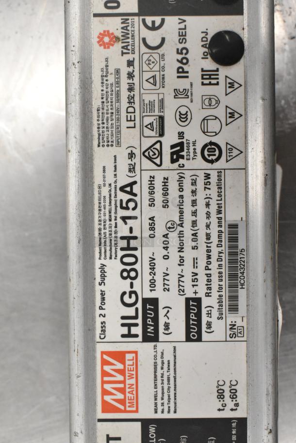 Mean Well MW HLG-80H-15A Power Supply, input 100-240V, output 15V, 75W, IP65 rated, suitable for wet locations, serial number HC04322715.